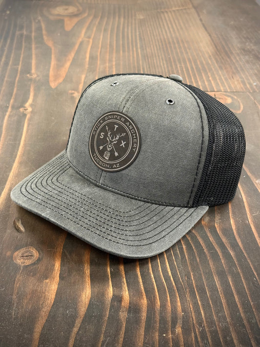 STK Charcoal/Black Trucker Hat - Leather Circle Deer Patch